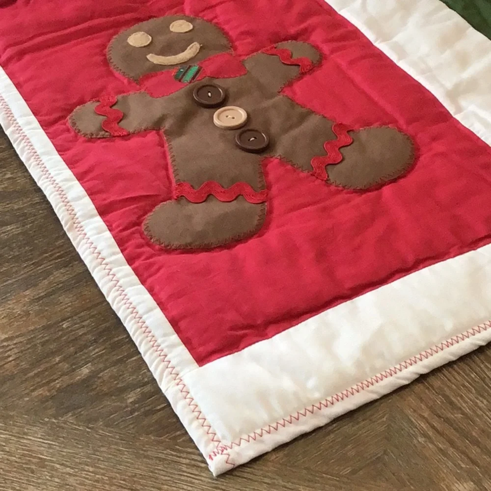 Handmade Christmas-themed applique quilt